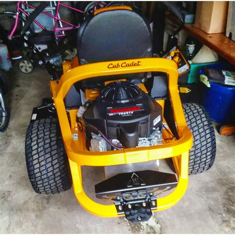 A Cub Cadet lawn mower wont move forward or reverse when the transmission bypass lever is engaged; the pump belt is loose, worn, or broken; the tensioner pulley is worn; the spring is stretched or missing; the hydraulic oil is hot, old, or at an insufficient level; or air is trapped in the hydraulic system. . Cub cadet zt1 50 belt replacement